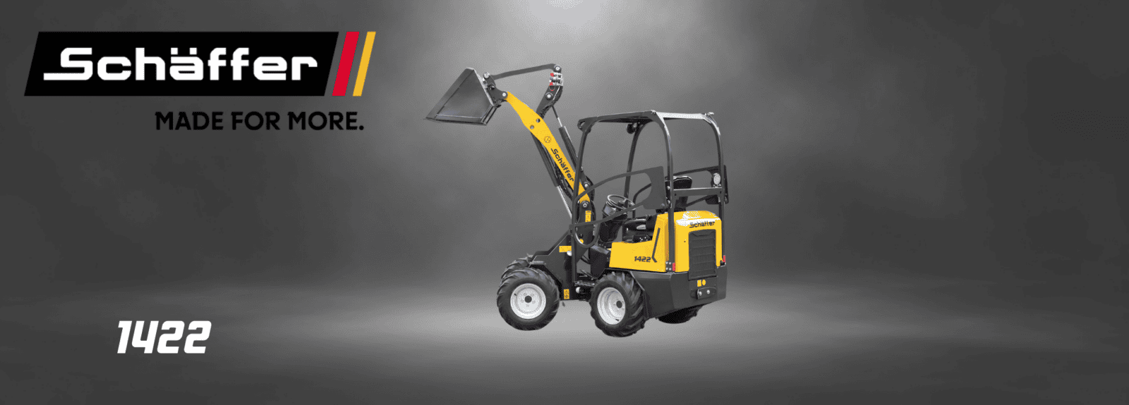Schäffer 1422 pienkuormaaja kauhalla studiokuvassa