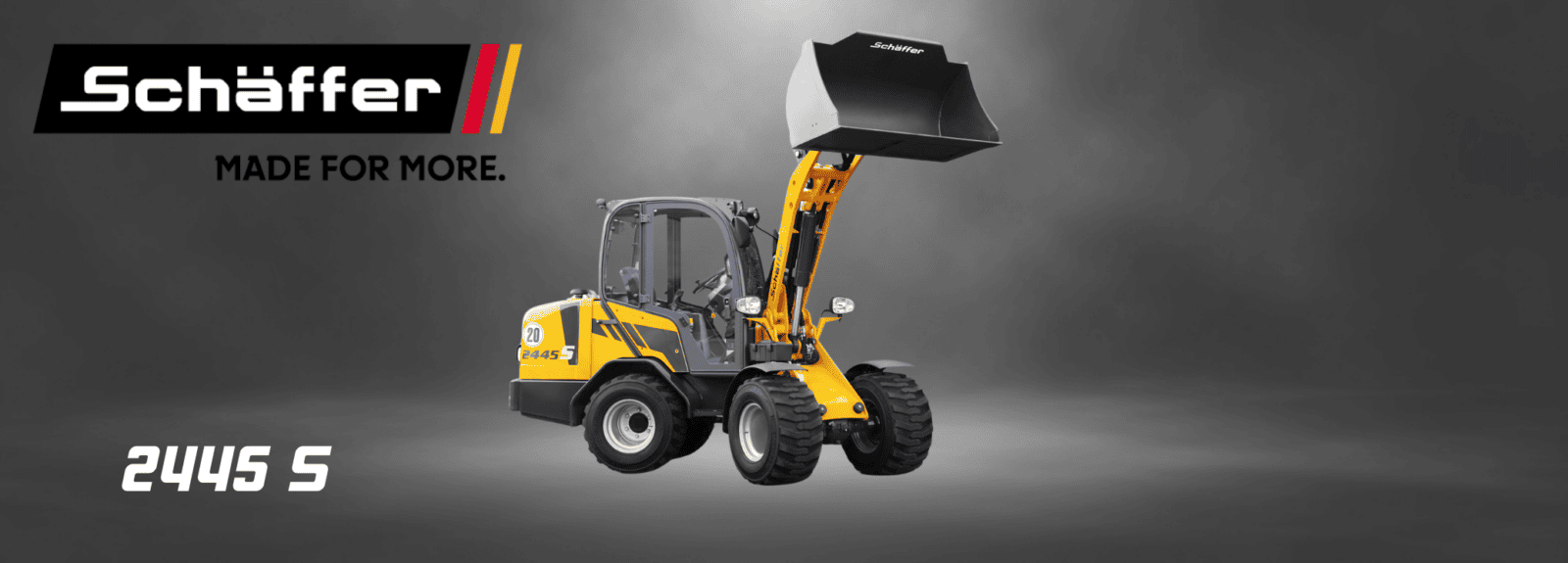 Schäffer 2445 S pyöräkuormaaja studiokuvassa kauhalla